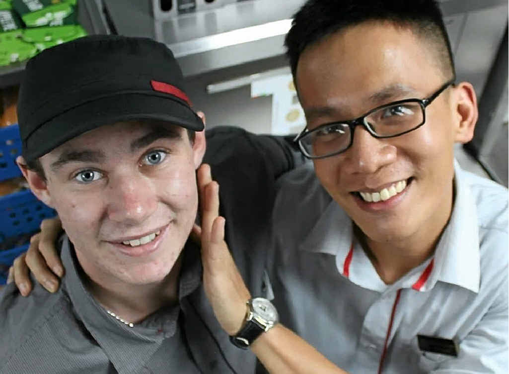 NEW MATES: Kyle and one of the many Vietnamese friends he made while working in Ho Chi Minh City.